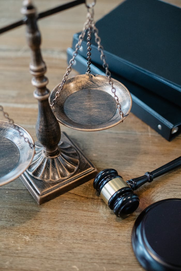 Crafting Captivating Headlines: Your awesome post title goes here From above of judicial symbols consisting of Scales of Justice and small judge hammer with curly handle